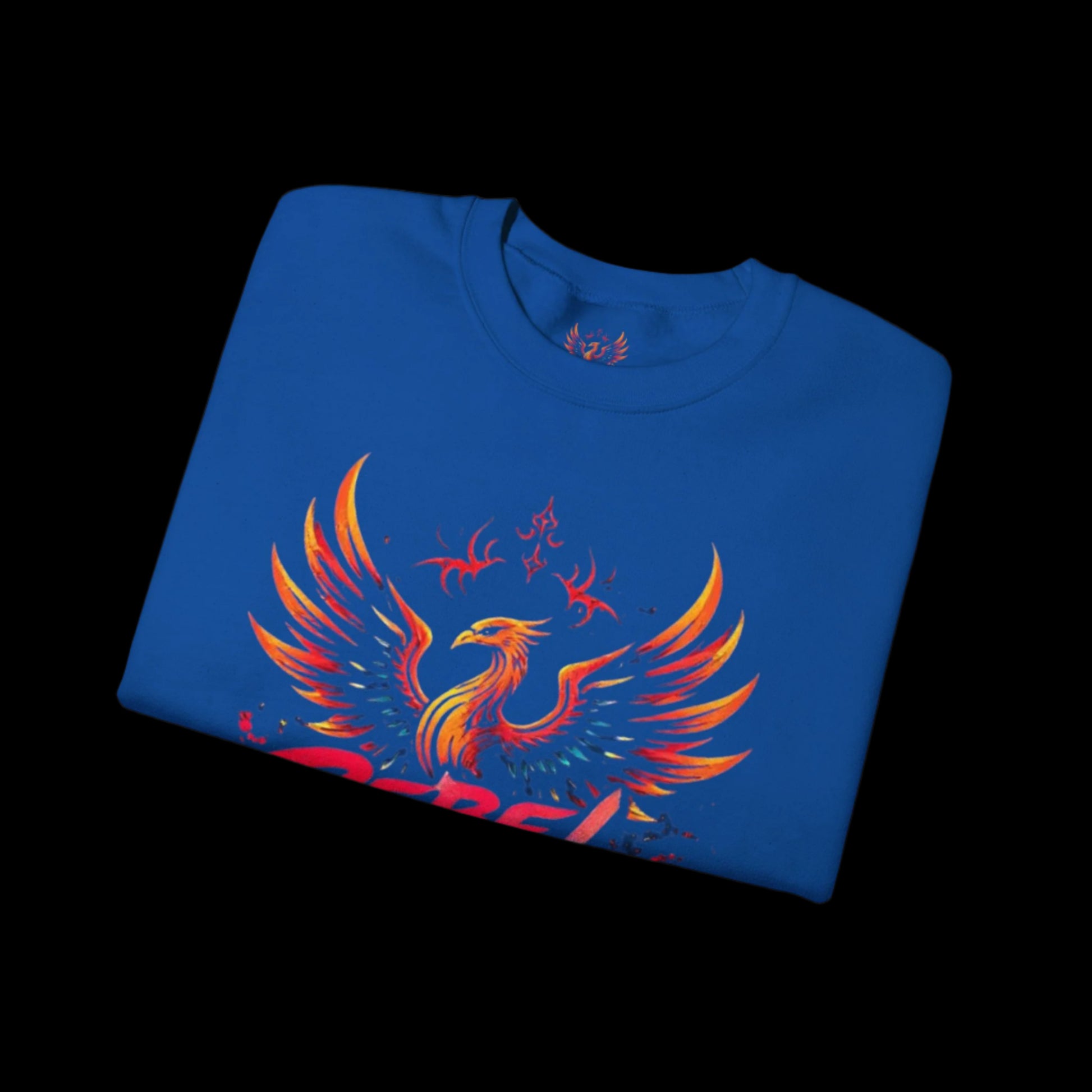 Folded blue t-shirt with a red and orange phoenix design on a white background