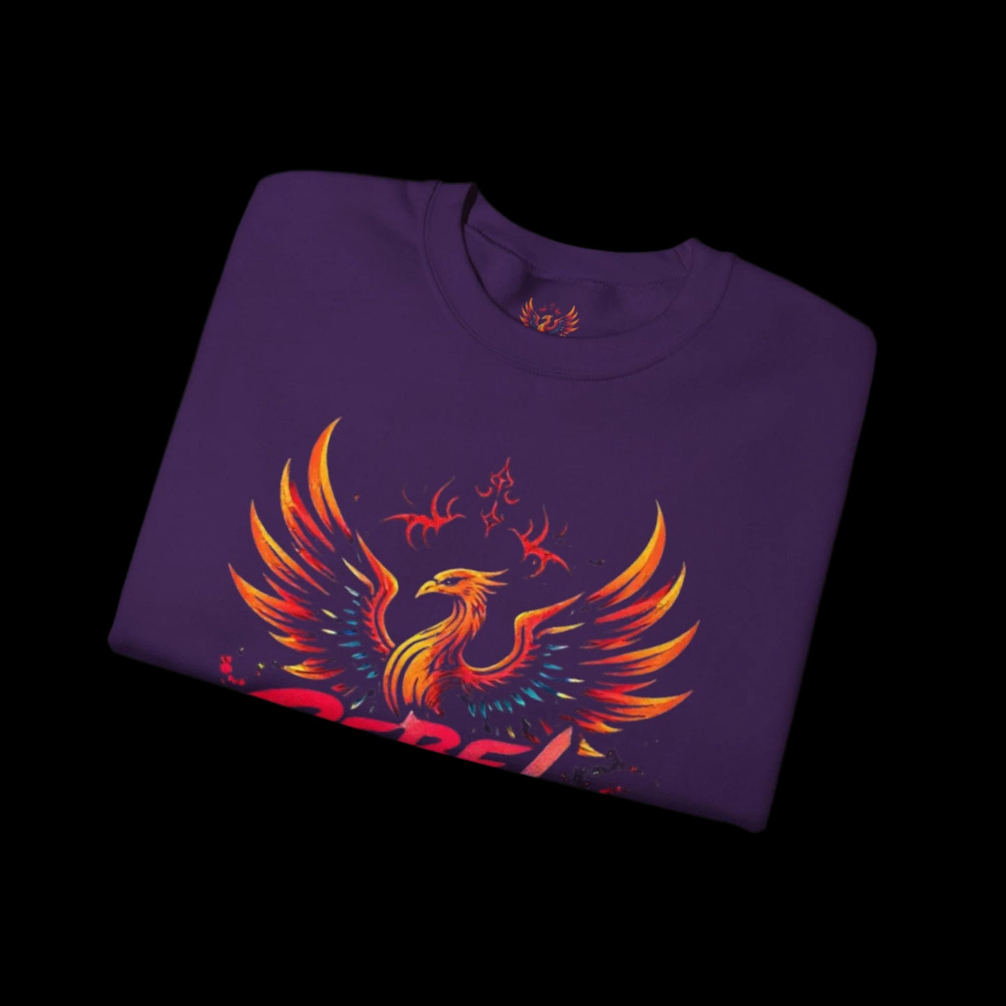 Folded purple sweatshirt with a colorful phoenix design on a white background