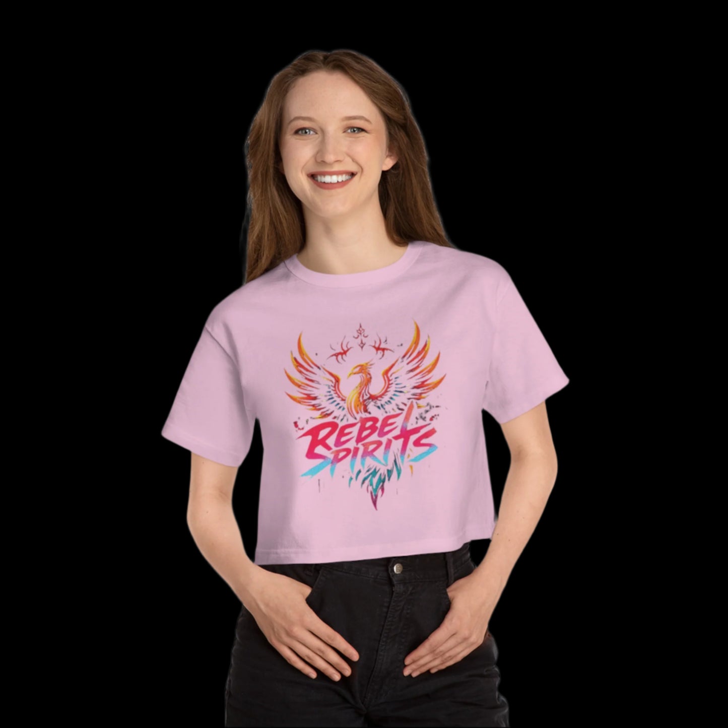 Person wearing a pink t-shirt with a colorful design and text on a white background